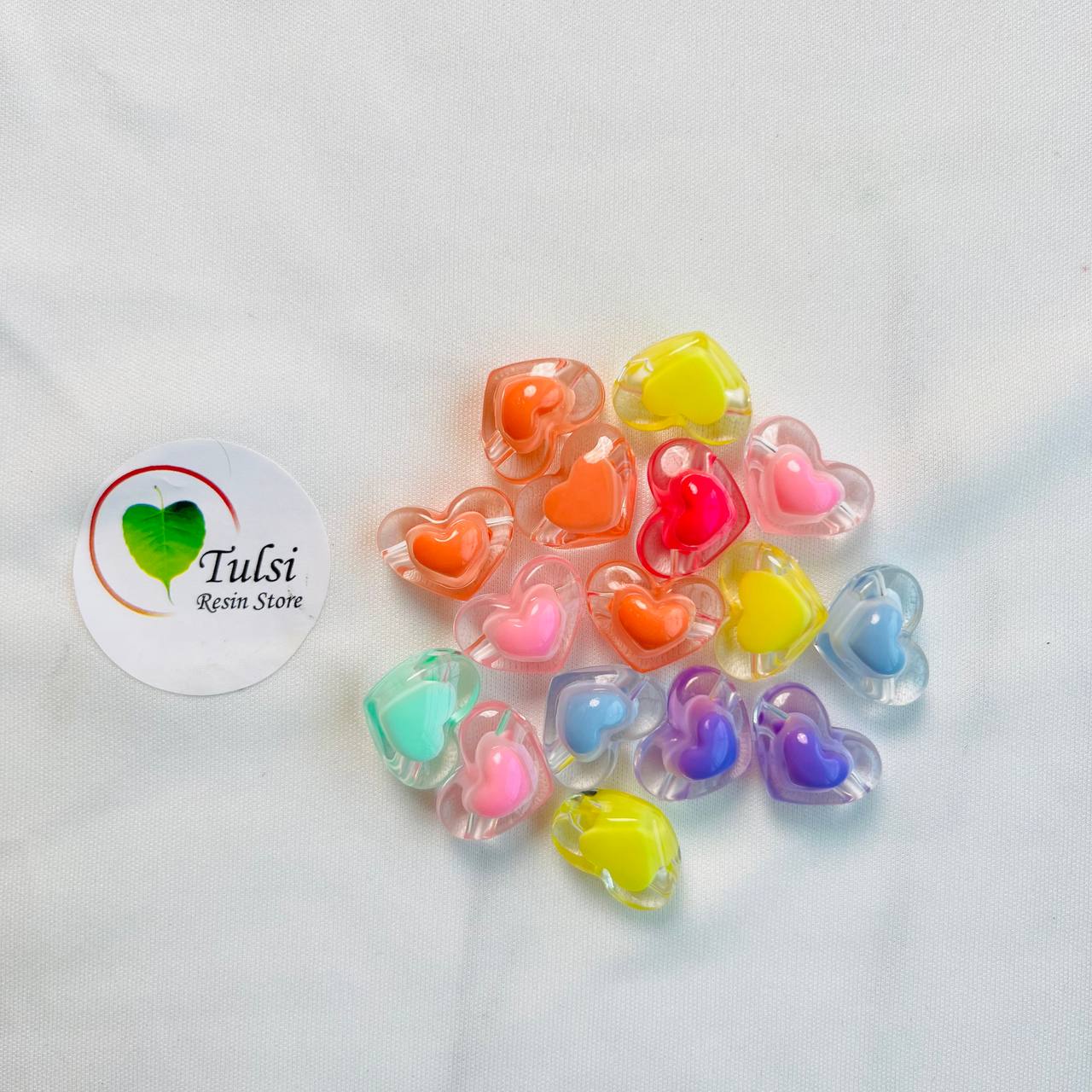 خرزات قلب ملونة (10 قطع)