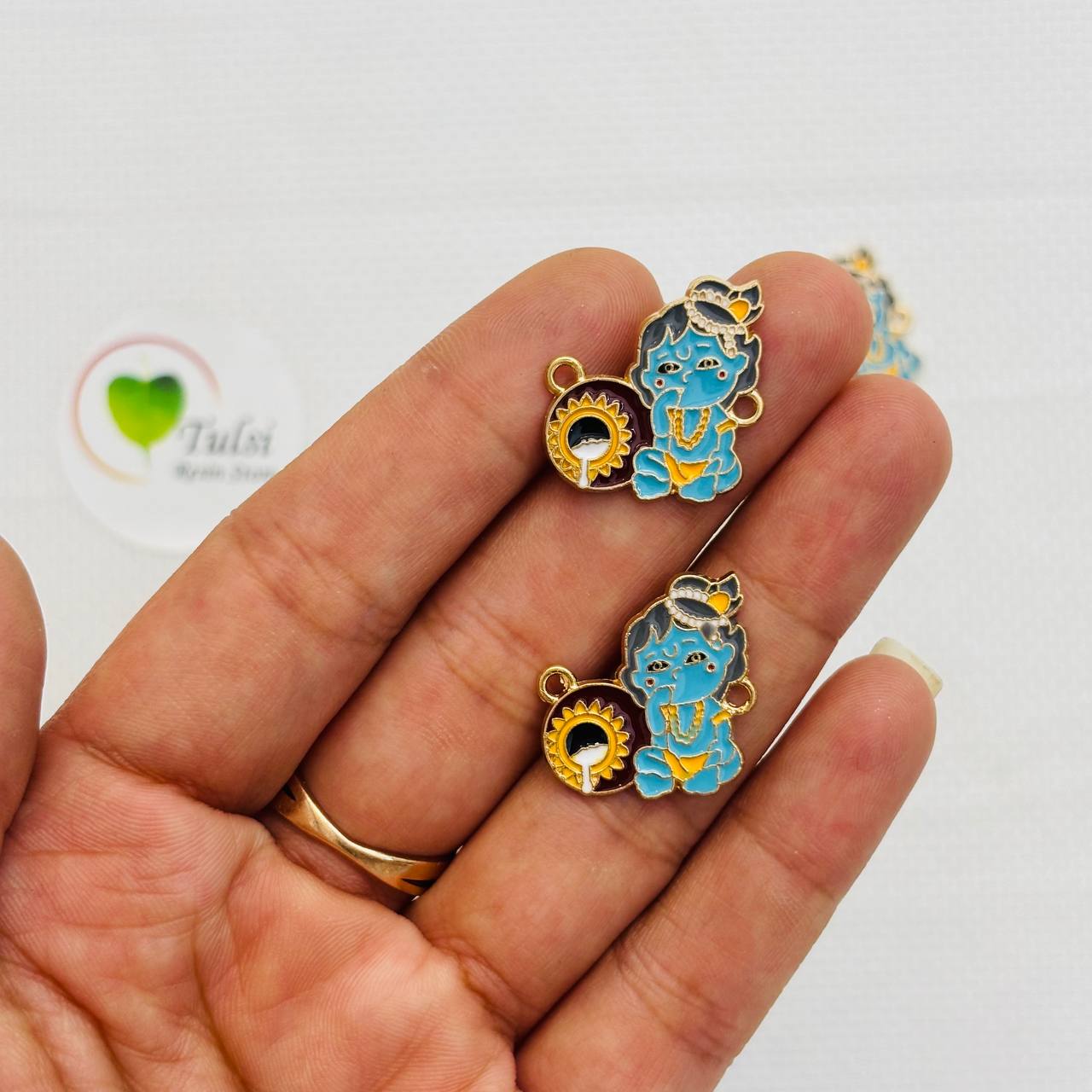 Rakhi Charm (L)