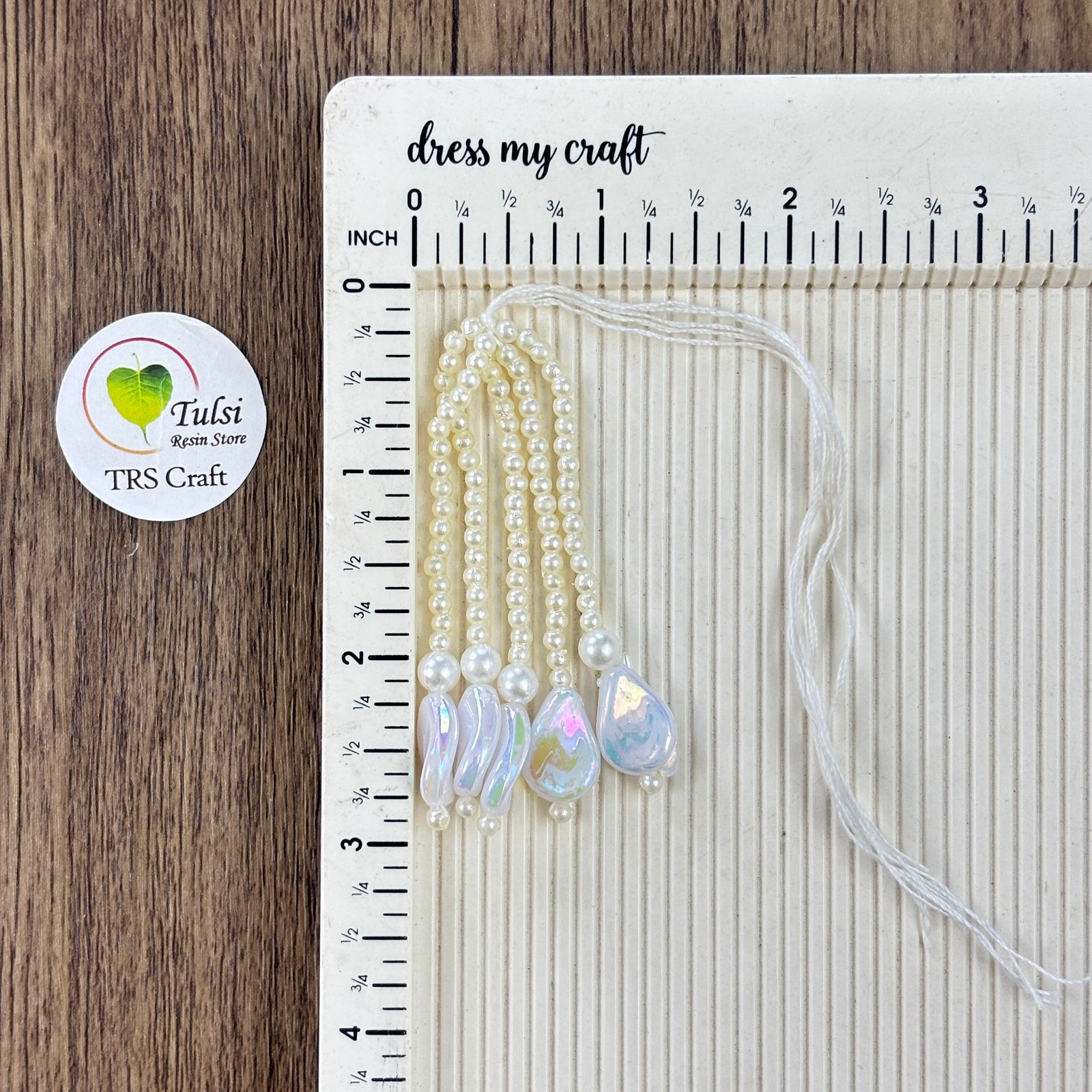 Rakhi Hanging (F) White Tulsi Resin Store