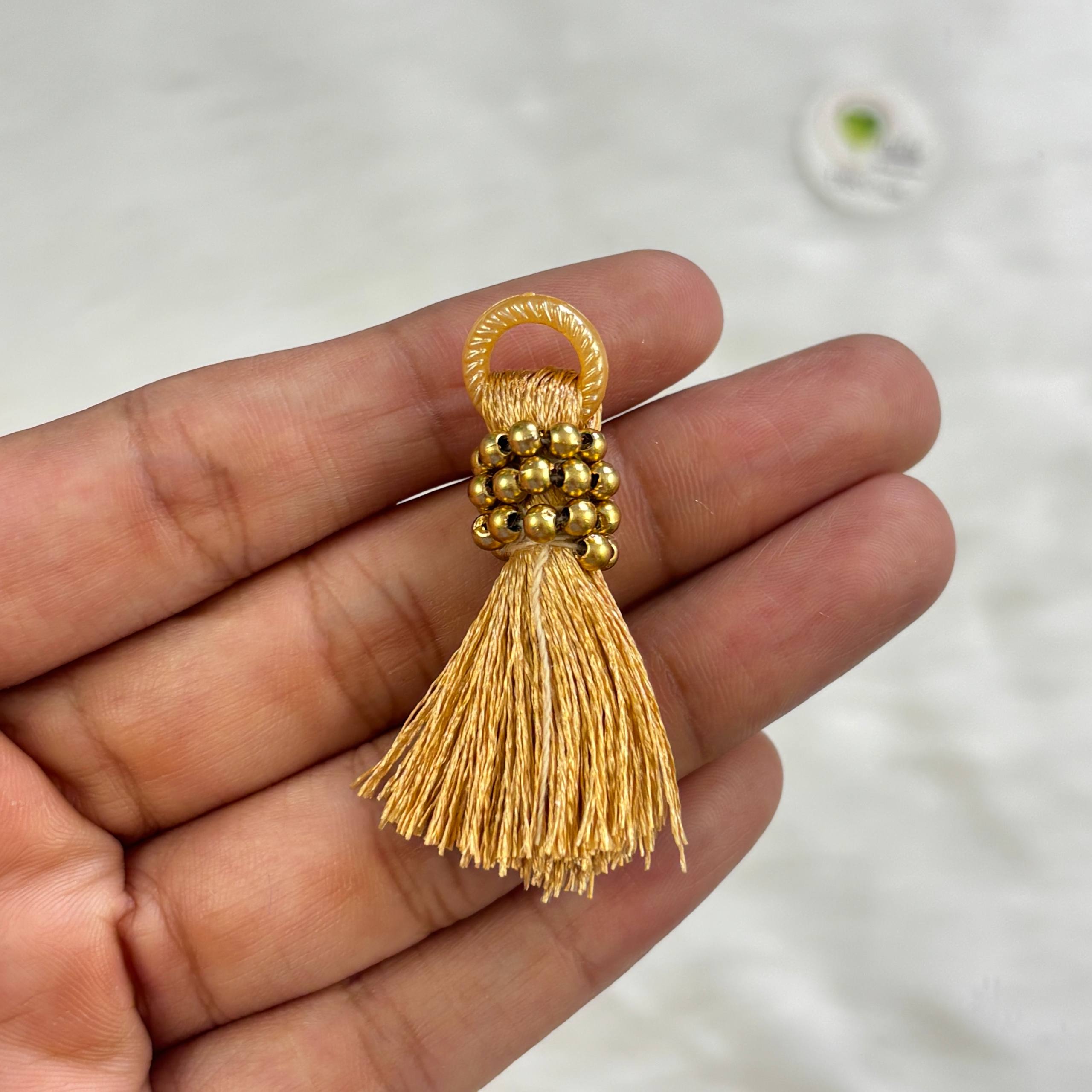 Rakhi Hanging (I)(12 Piece) Gold Tulsi Resin Store