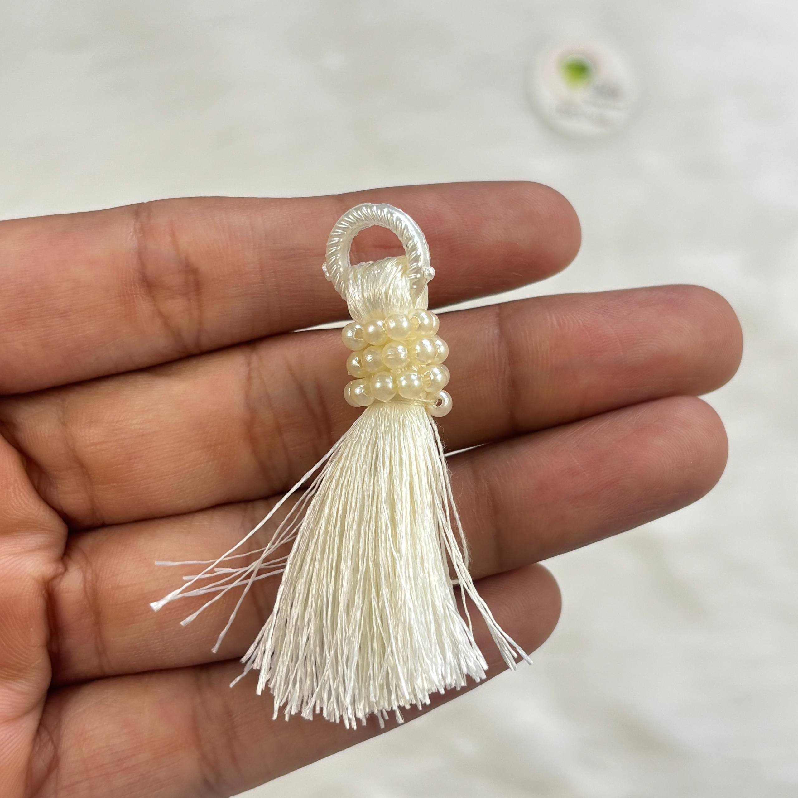 Rakhi Hanging (I)(12 Piece) Off White Tulsi Resin Store