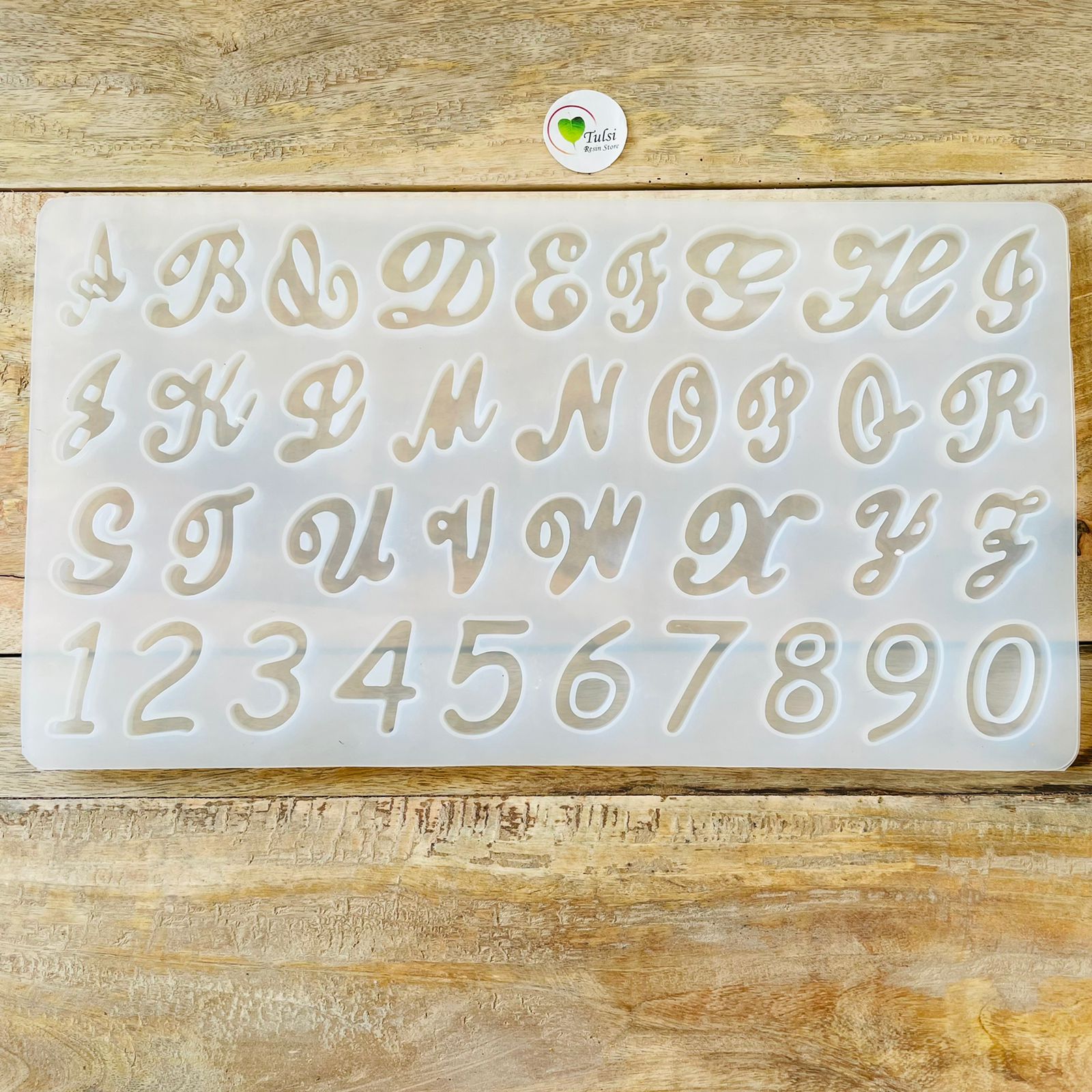 Cursive alphabet mould