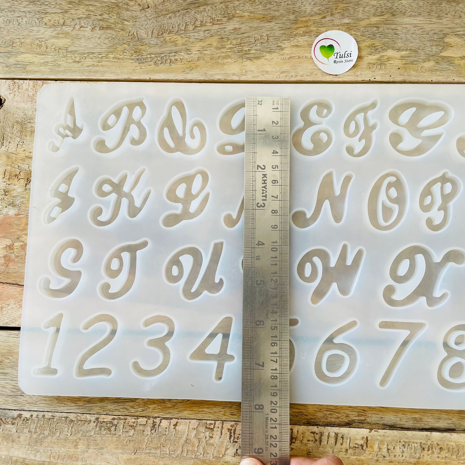 Cursive alphabet mould