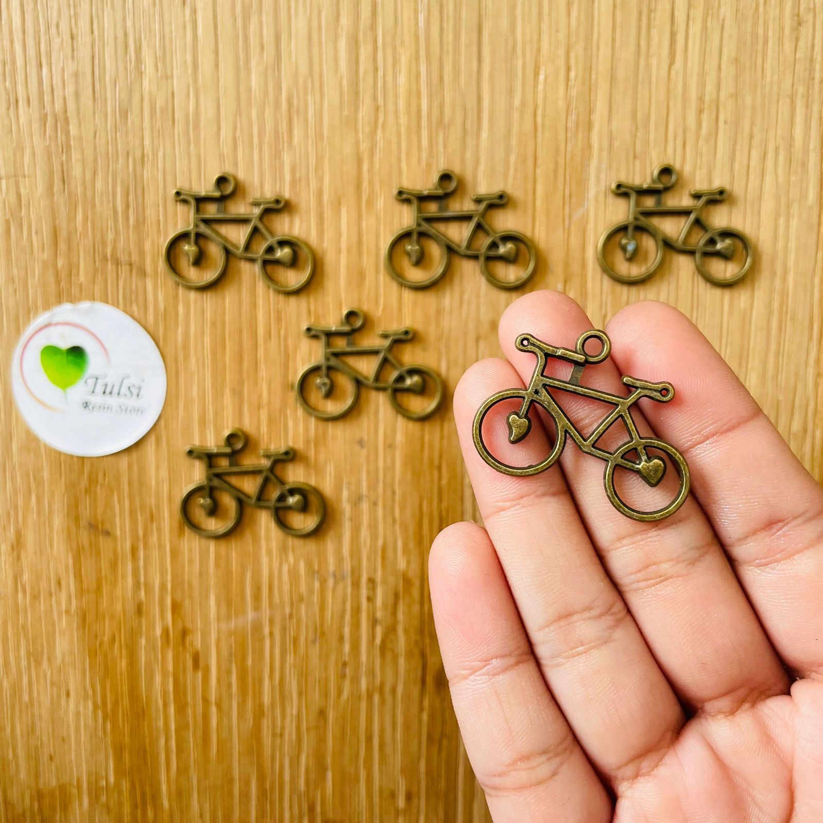 Antique Cycle charm